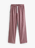 Multi Show someone special you care by gifting this three-piece pyjama set, including a long-sleeve top, drawstring bottoms and matching slippers.  Women