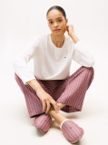 Multi Show someone special you care by gifting this three-piece pyjama set, including a long-sleeve top, drawstring bottoms and matching slippers.  Women