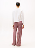 Multi Show someone special you care by gifting this three-piece pyjama set, including a long-sleeve top, drawstring bottoms and matching slippers.  Women