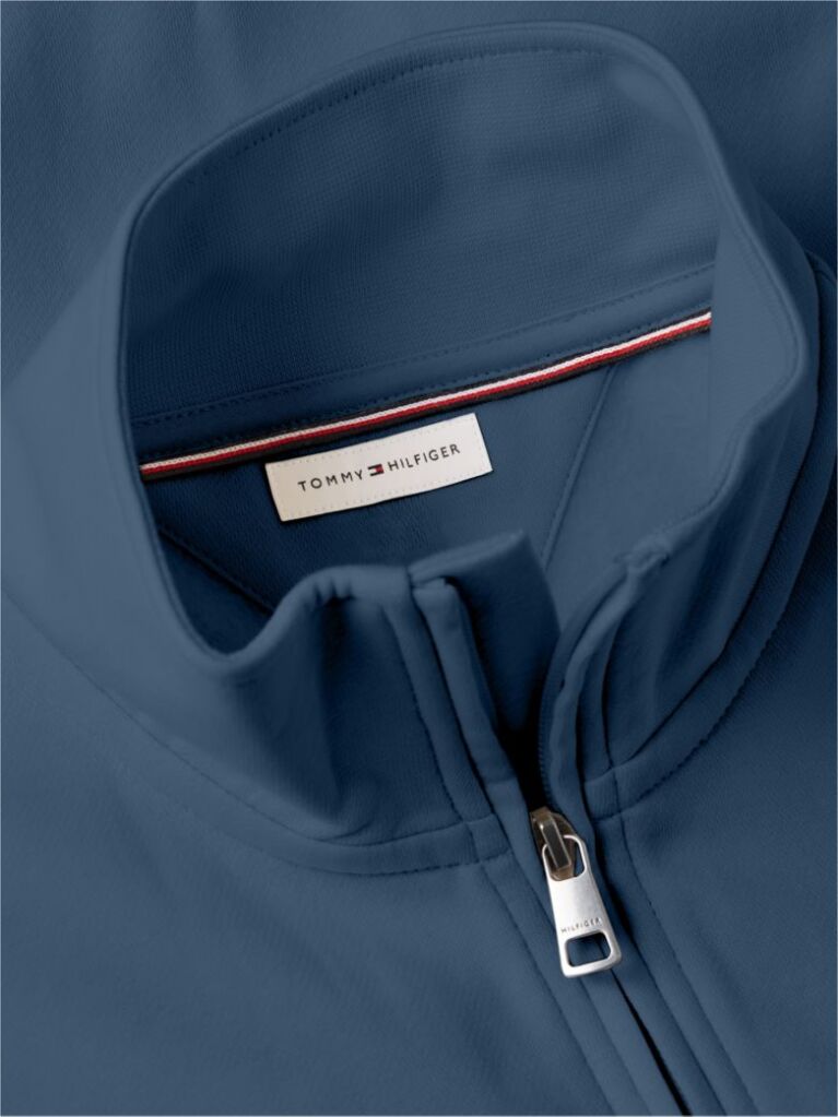 Blue Combining casual style with enhanced comfort, this sweatshirt is made from flex fleece and has a cosy, zip-adjustable mock turtleneck.  Men