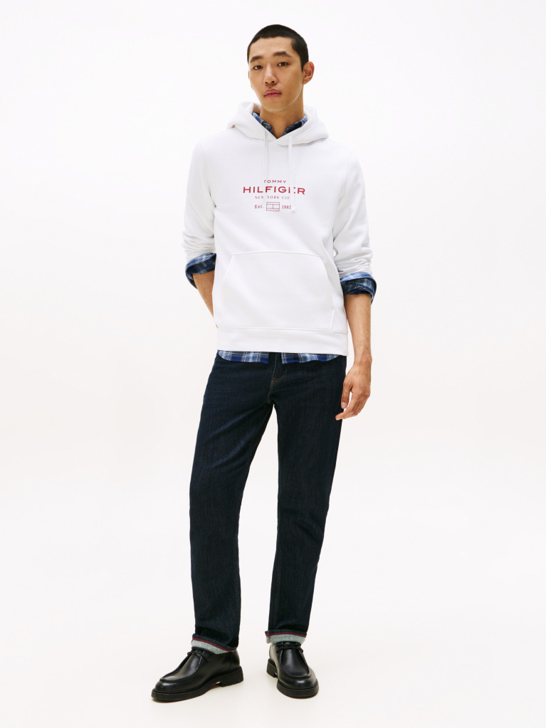 White Perfect for fighting the cold, this warm hoodie is enhanced with a stylish, tonal Tommy Hilfiger logo and crafted from high-quality interlock knit.  Men