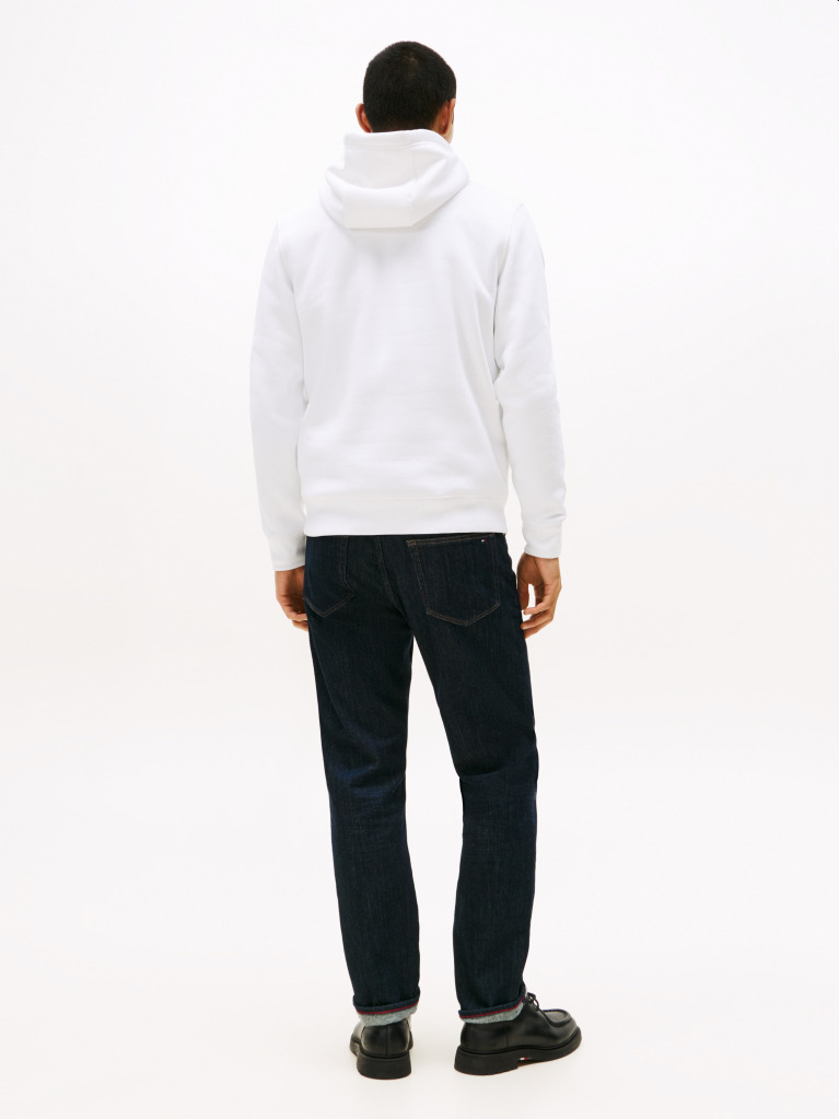 White Perfect for fighting the cold, this warm hoodie is enhanced with a stylish, tonal Tommy Hilfiger logo and crafted from high-quality interlock knit.  Men