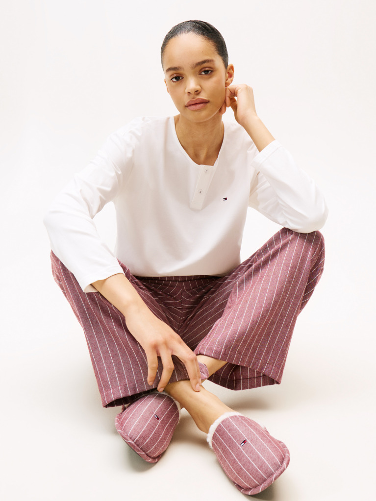 Multi Show someone special you care by gifting this three-piece pyjama set, including a long-sleeve top, drawstring bottoms and matching slippers.  Women